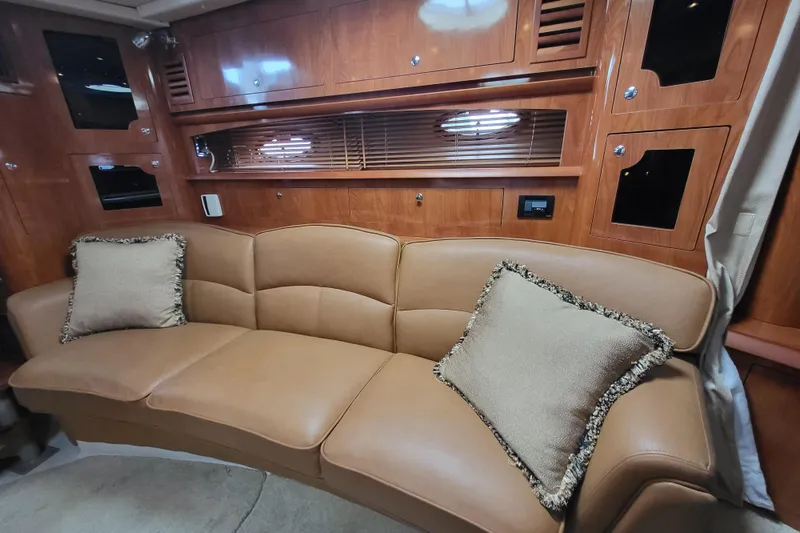 Slide: The Image of Luxurious interior of 2006 Four Winns 348 Vista yacht with plush leather seating. - 37