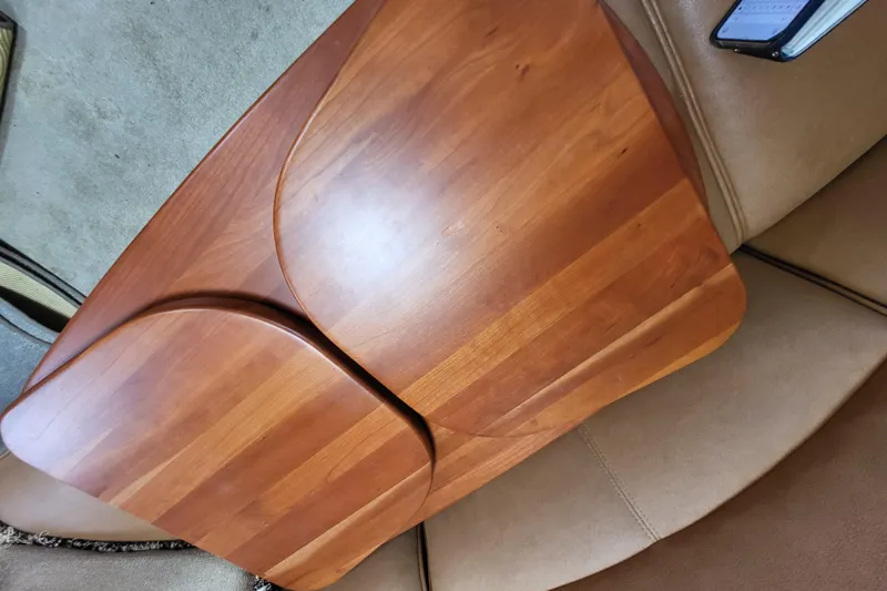 Slide: The Image of Wooden table on a 2006 Four Winns 348 Vista boat interior. - 42