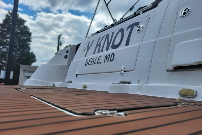 Slide: The Image of 2006 Four Winds Vista 348 boat with "Y Knot" name, docked in Deale, MD. - 6
