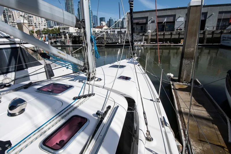 Slide: The Image of Sailboat docked in marina, Hunter 45 CC, 2005 model, urban skyline background. - 10