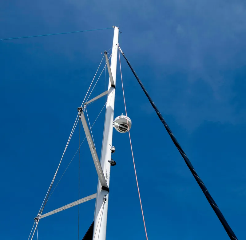 Slide: The Image of Sailboat mast of 2005 Hunter 45 CC against clear blue sky. - 18