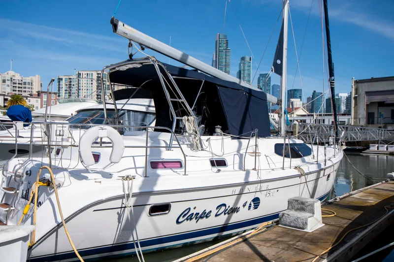 Slide: The Image of Sailboat "Carpe Diem" docked, Hunter 45 CC, 2005 model, city skyline in background. - 6