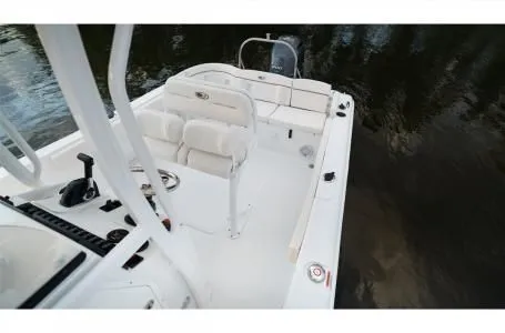 Slide: The Image of Interior view of a 2021 Sea Hunt Ultra 229 boat on the water. - 17