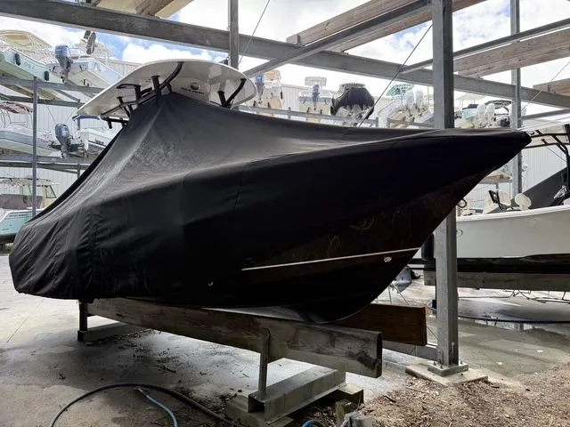 Slide: The Image of Covered 2021 Sea Hunt Ultra 229 boat in storage. - 26