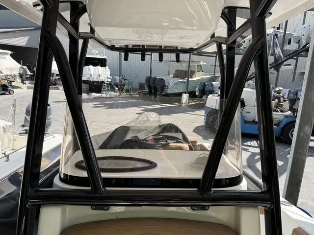 Slide: The Image of Interior view of a 2021 Sea Hunt Ultra 229 boat at a marina. - 31