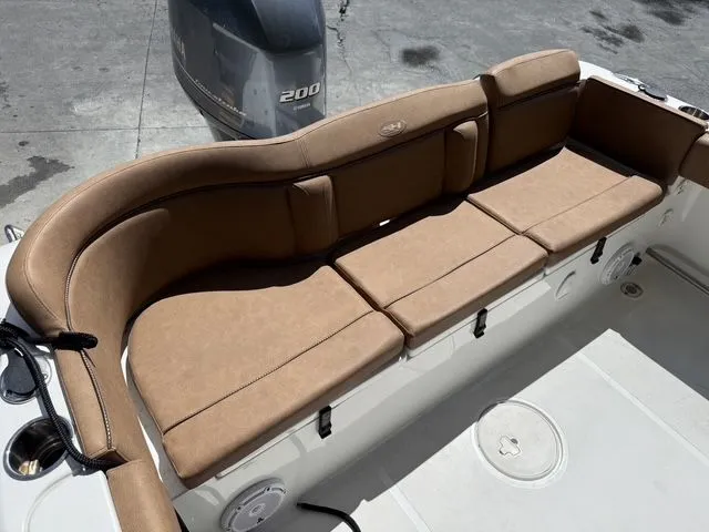Slide: The Image of Brown seating on Sea Hunt Ultra 229 boat, 2021 model. - 36