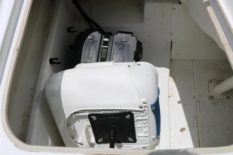 Slide: The Image of Battery compartment of a 2018 Tahoe 450 TF boat, featuring dual batteries. - 23