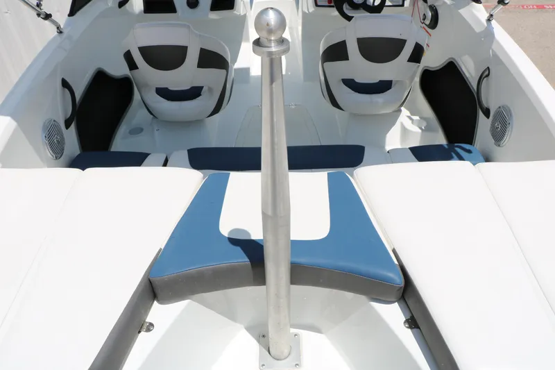 Slide: The Image of Interior view of 2018 Tahoe 450 TF boat with seating and steering wheel. - 24