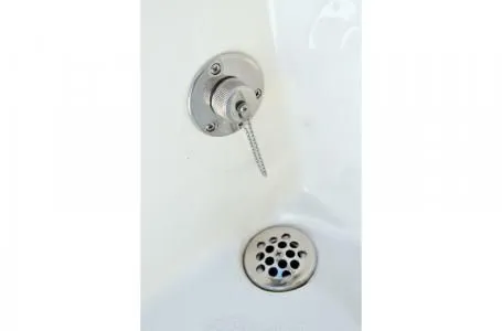 Slide: The Image of Drain and showerhead in NauticStar 2302 Legacy boat, year 2019. - 14