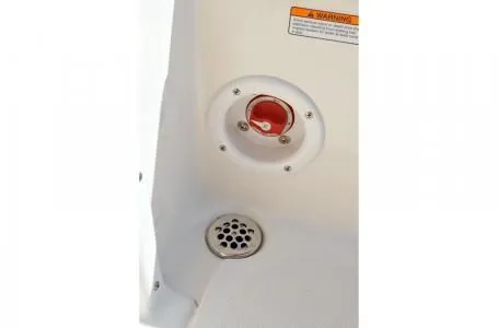 Slide: The Image of NauticStar 2302 Legacy 2019 boat switch and drain. - 18