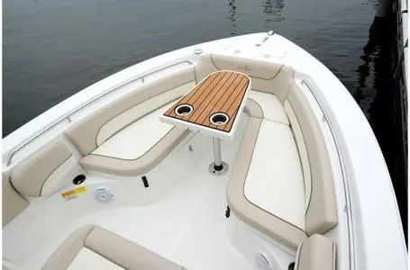 Slide: The Image of Interior view of 2019 NauticStar 2302 Legacy boat with seating area. - 21