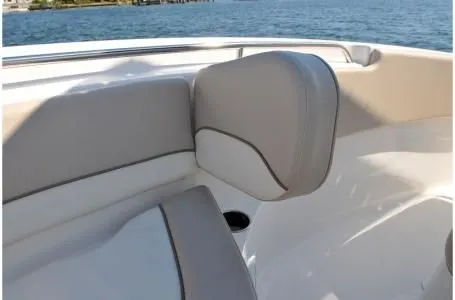 Slide: The Image of Interior of 2019 NauticStar 2302 Legacy boat by the water. - 33