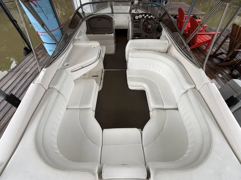 Slide: The Image of Interior of a 2005 Regal 2900 BR boat with white seating. - 3