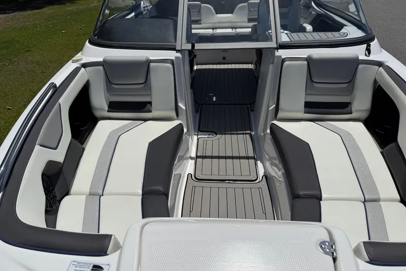 Slide: The Image of 2020 Yamaha Boats 212S interior with sleek seating and modern design. - 10
