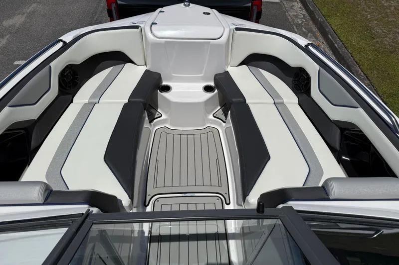 Slide: The Image of 2020 Yamaha Boats 212S interior with sleek seating and modern design. - 11