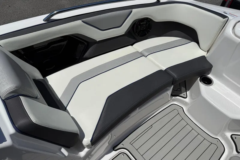Slide: The Image of 2020 Yamaha Boats 212S interior seating with sleek, modern design and comfortable upholstery. - 12