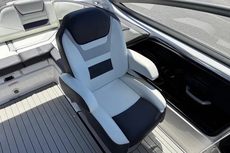 Slide: The Image of 2020 Yamaha Boats 212S interior with sleek seating and modern design. - 16