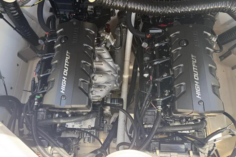 Slide: The Image of 2020 Yamaha Boats 212S high output engines in a boat engine compartment. - 26