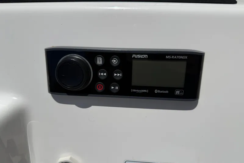 Slide: The Image of Fusion MS-RA70NSX stereo system on 2020 Yamaha Boats 212S, featuring Bluetooth and SiriusXM. - 27