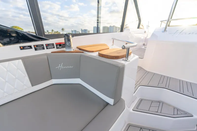Slide: The Image of Luxurious seating area on a 2027 Hanover 387 boat with modern design elements. - 17