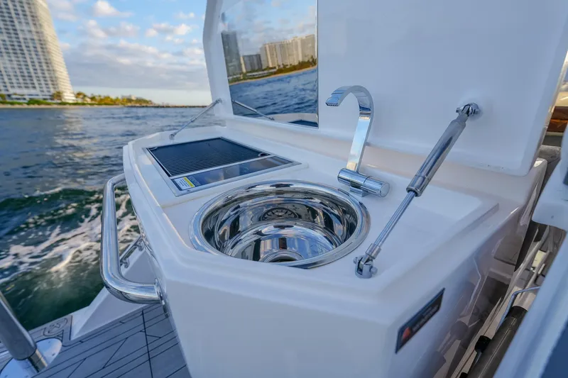 Slide: The Image of Luxury boat kitchen area with sink and grill, Hanover 387, 2027 model, ocean view. - 22