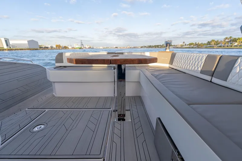 Slide: The Image of Luxurious Hanover 387 yacht deck with elegant seating and wooden table, 2027 model. - 33