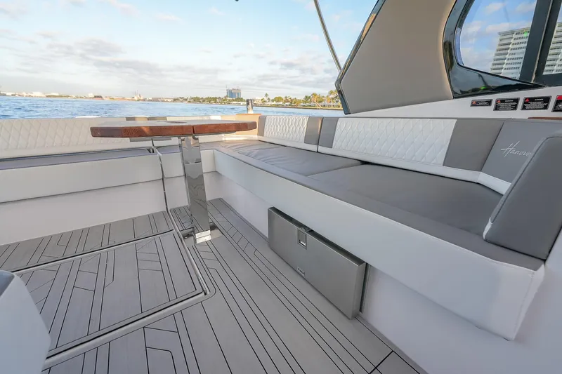 Slide: The Image of Luxurious Hanover 387 yacht interior with elegant seating and wooden table, 2027 model. - 34