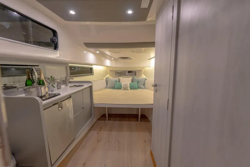 Slide: The Image of Luxurious interior of 2027 Hanover 387 yacht with cozy bed and kitchenette. - 36