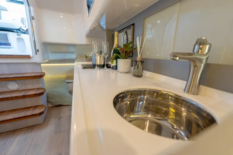 Slide: The Image of Modern kitchen interior of Hanover 387 yacht, featuring sleek sink and elegant decor, 2027 model. - 42