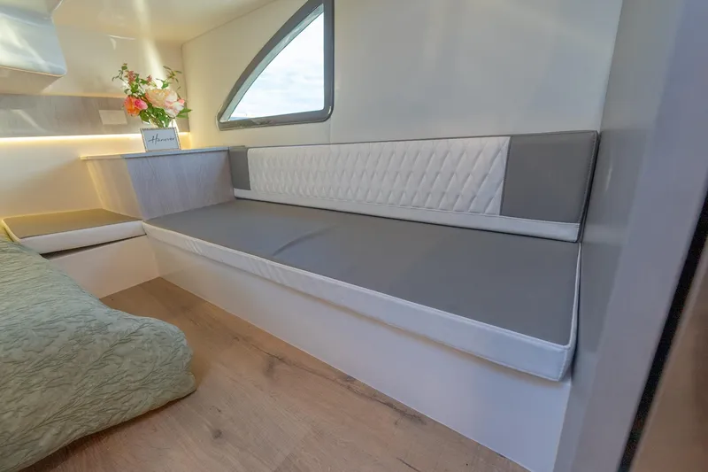 Slide: The Image of Modern interior of Hanover 387, 2027 model, featuring sleek seating and elegant decor. - 46