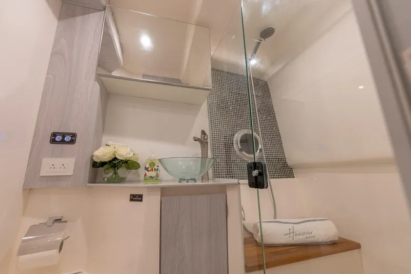 Slide: The Image of Modern bathroom in 2027 Hanover 387 yacht with glass sink and elegant decor. - 49