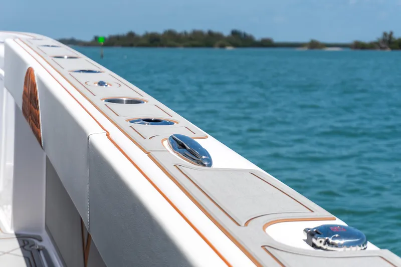 Slide: The Image of 2026 Twin Vee 400 GFX2 CC boat detail with ocean backdrop. - 12