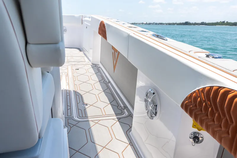 Slide: The Image of 2026 Twin Vee 400 GFX2 CC boat interior with sleek design and modern features. - 14