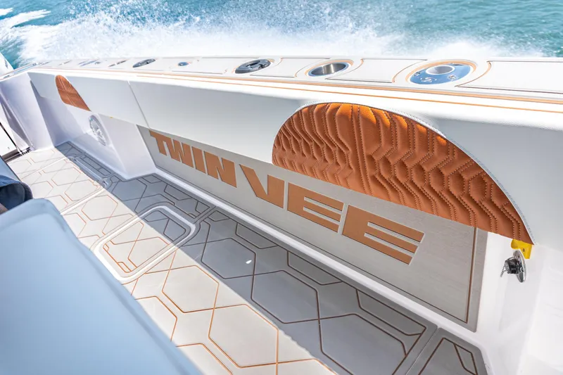Slide: The Image of 2026 Twin Vee 400 GFX2 CC boat interior with sleek design and modern features. - 18