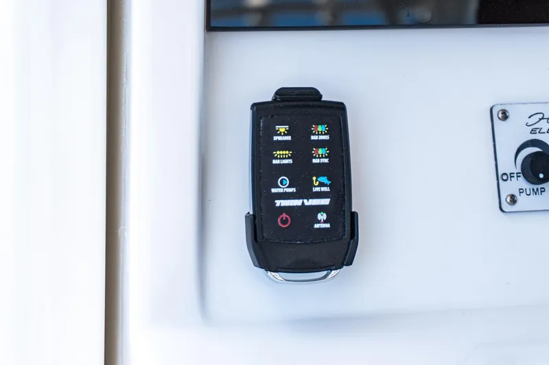 Slide: The Image of Control panel of 2026 Twin Vee 400 GFX2 CC boat with digital display. - 21