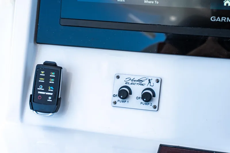 Slide: The Image of Control panel on 2026 Twin Vee 400 GFX2 CC boat with Hooker Electric switches. - 40
