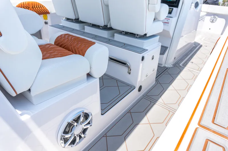 Slide: The Image of Luxurious interior of 2026 Twin Vee 400 GFX2 CC boat with plush seating. - 8