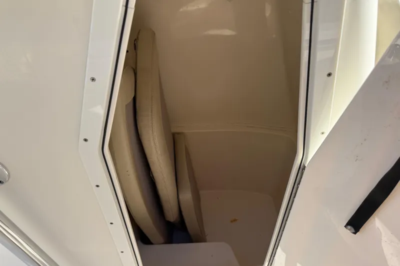 Slide: The Image of Interior storage compartment of a 2018 Cobia 220 Center Console boat. - 17