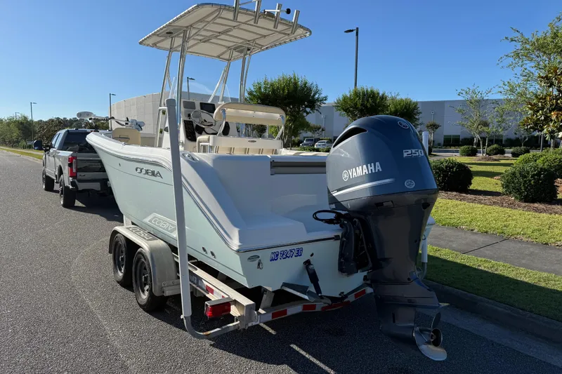 Slide: The Image of 2018 Cobia 220 Center Console boat with Yamaha 250 engine on trailer. - 4