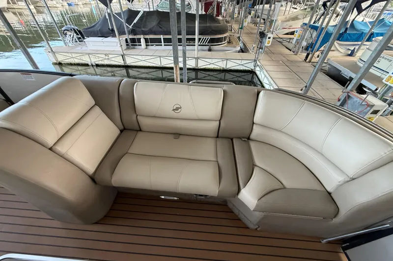 Slide: The Image of Luxurious seating on 2016 Starcraft MX 25 DL boat, docked at marina. - 10
