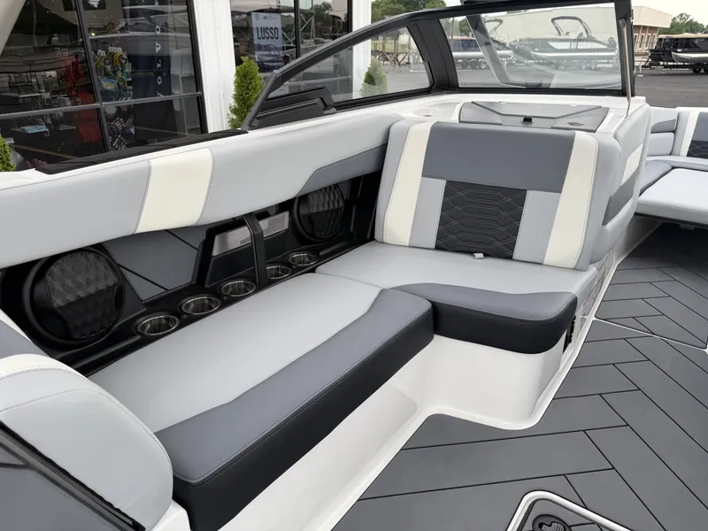 Slide: The Image of Interior of 2023 Malibu 26LSV with gray and white seating. - 14