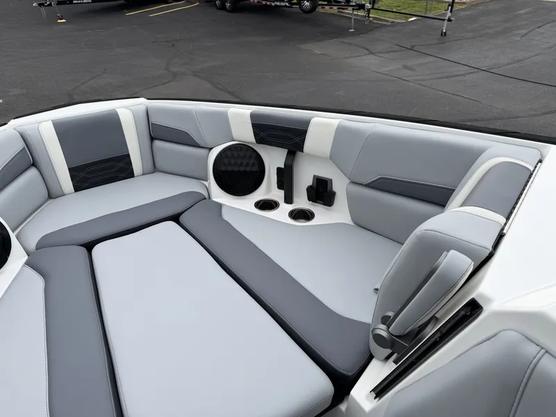 Slide: The Image of Interior of 2023 Malibu 26LSV boat with gray upholstery. - 21