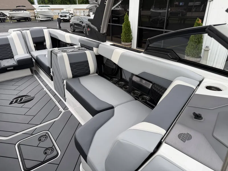 Slide: The Image of Interior of 2023 Malibu 26LSV boat with gray seating. - 23