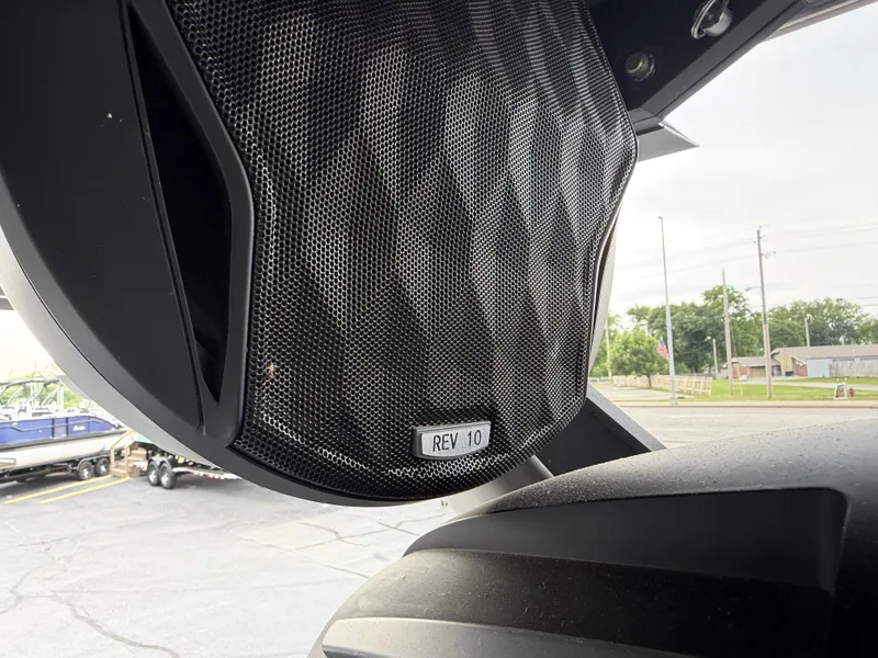 Slide: The Image of Close-up of a speaker on a 2023 Malibu 26LSV boat. - 28