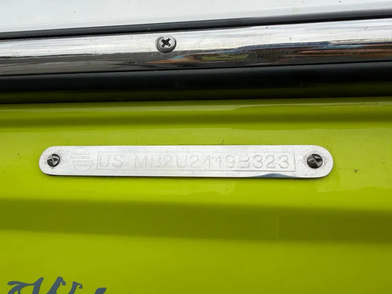 Slide: The Image of Serial number plate on a 2023 Malibu 26LSV boat. - 31