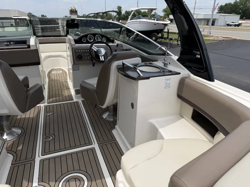 Slide: The Image of Interior of a 2013 Sea Ray 250SLX with sleek design features. - 10