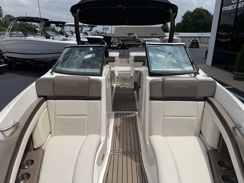 Slide: The Image of Interior of a 2013 Sea Ray 250SLX boat with luxurious seating. - 19