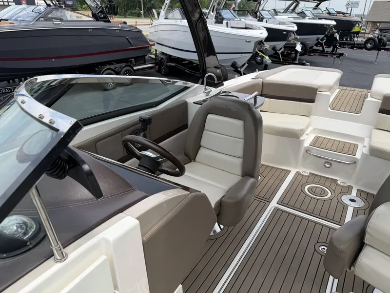 Slide: The Image of Interior of a 2013 Sea Ray 250SLX boat with luxurious seating. - 20