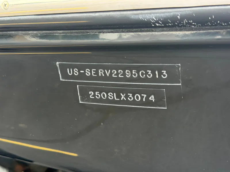 Slide: The Image of Serial number on a 2013 Sea Ray 250SLX boat hull. - 25