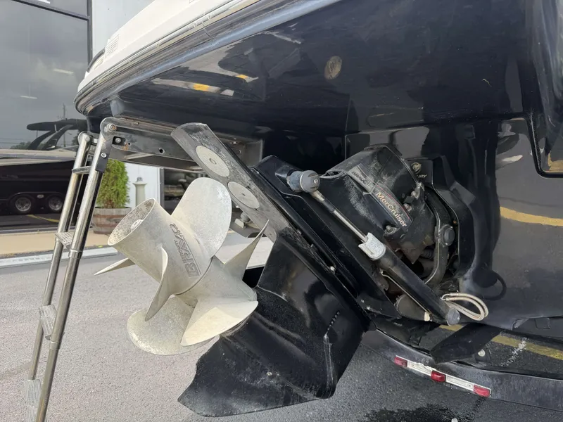 Slide: The Image of 2013 Sea Ray 250SLX boat motor and propeller close-up. - 7